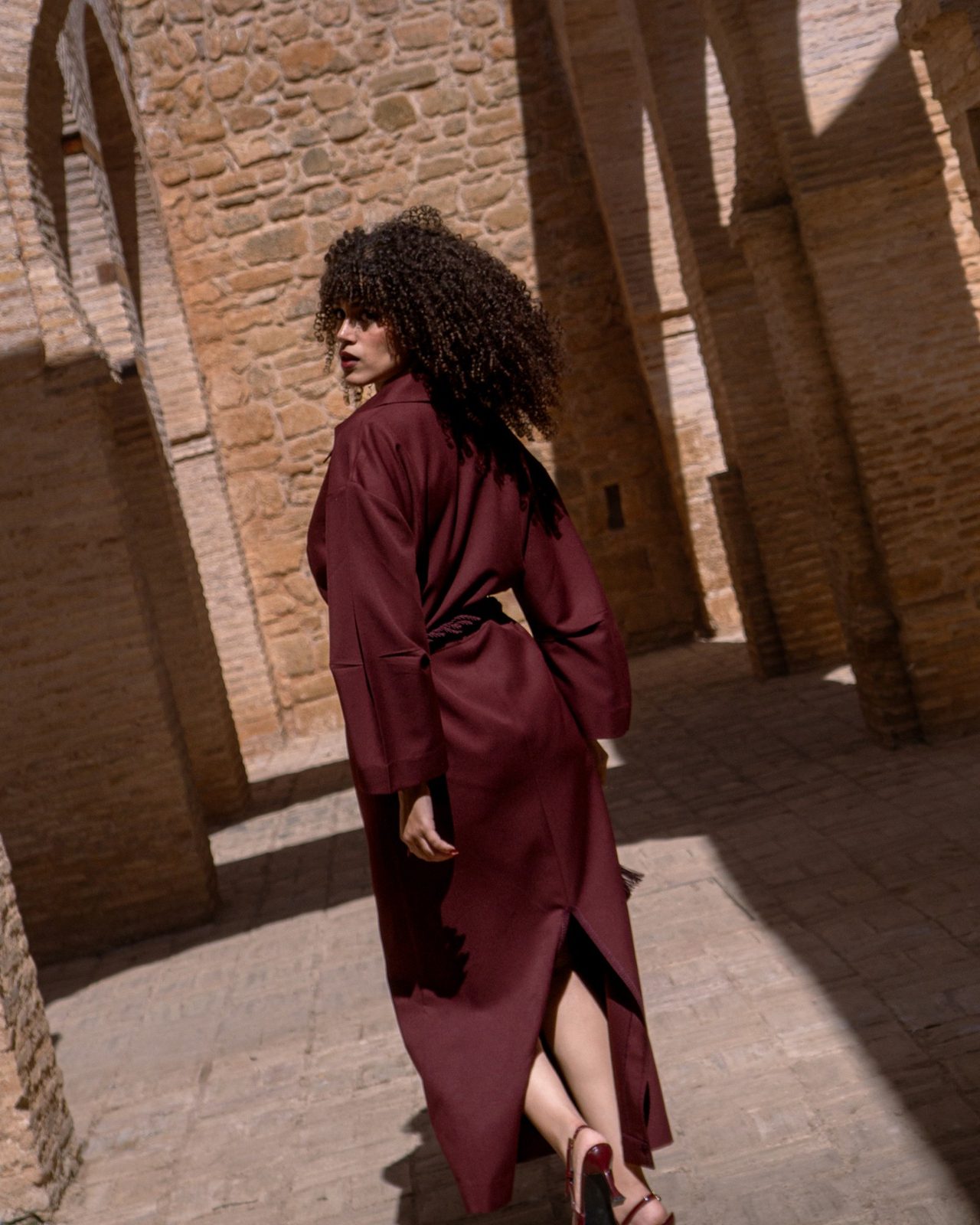 Third Layer dress walking through the ruins