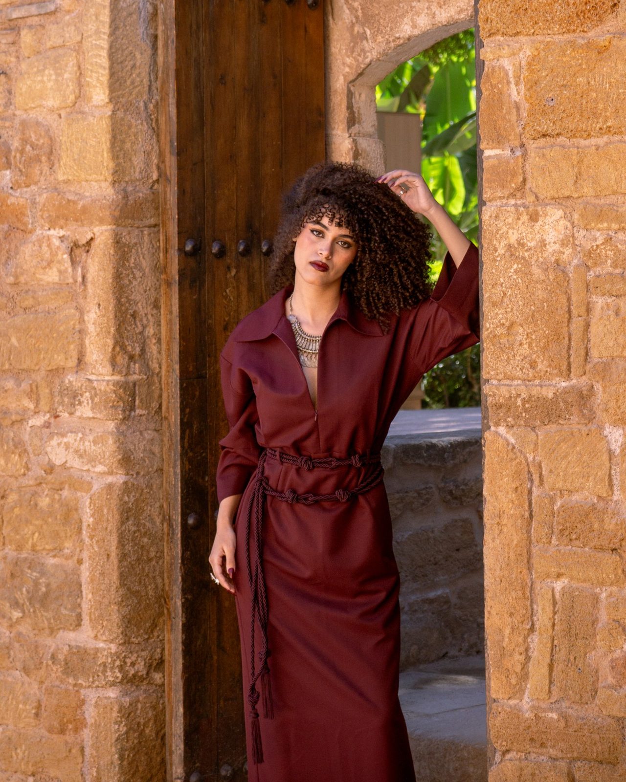 Third Layer dress in a stone passage